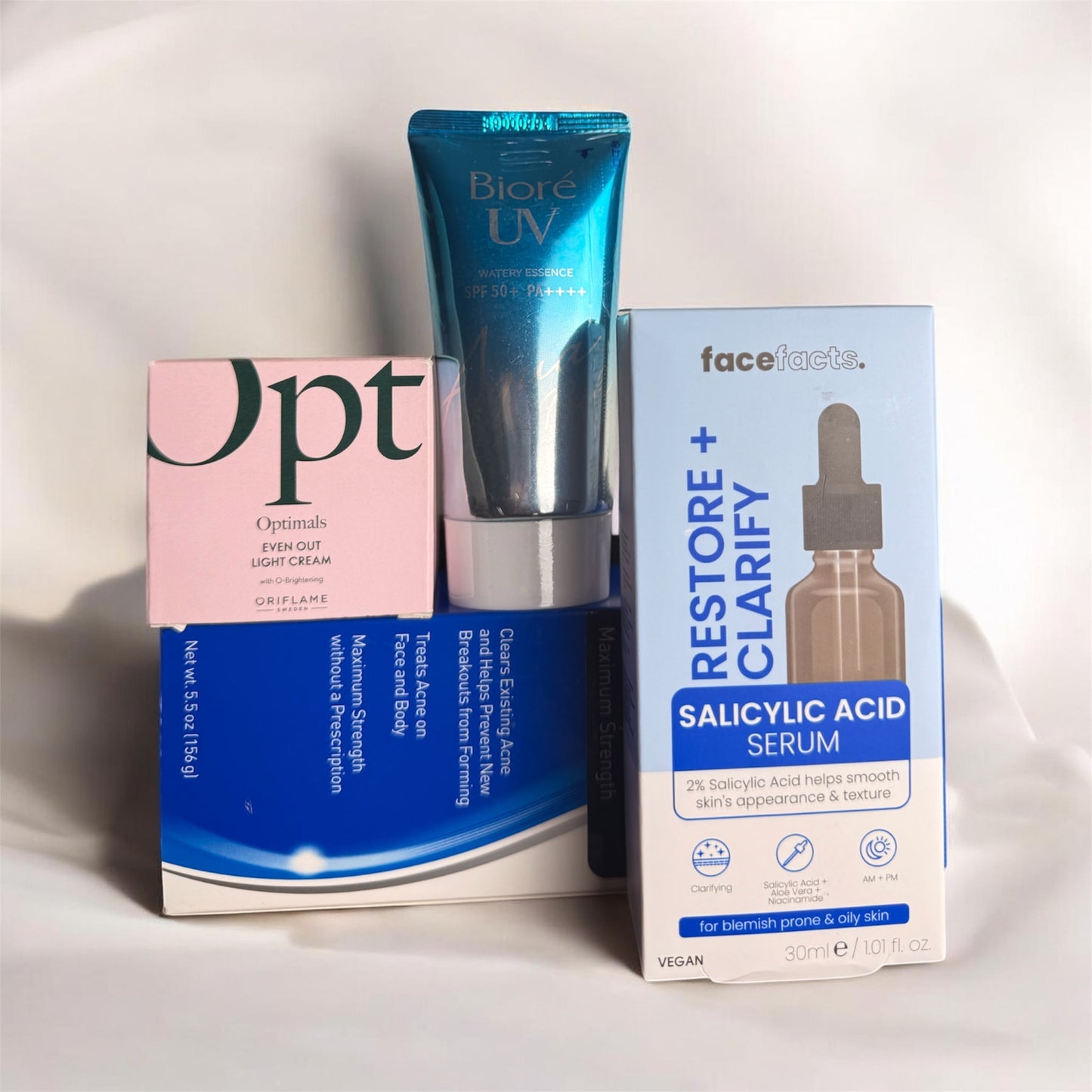Acne and breakouts treatment set of Panoxyl face wash, salicylic serum, face cream and sunscreen